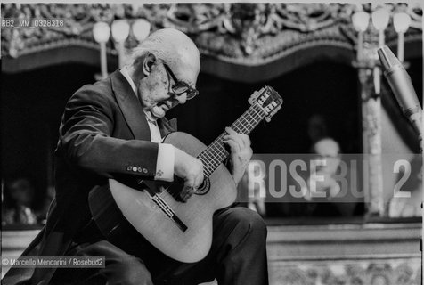 Venice, La Fenice Theater, 1980. Classical guitarist Andrés Segovia performing at his concert for receiving the A Life for Music award / Venezia, Teatro La Fenice, 1980. Il chitarrista classico Andrés Segovia durante il suo concerto in occasione del premio Una vita per la musica a lui attribuito - ©Marcello Mencarini/Rosebud2