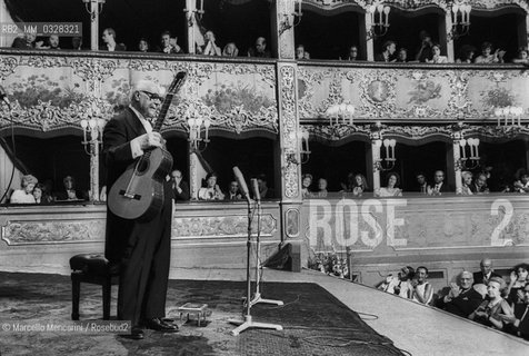 Venice, La Fenice Theater, 1980. Classical guitarist Andrés Segovia performing at his concert for receiving the A Life for Music award / Venezia, Teatro La Fenice, 1980. Il chitarrista classico Andrés Segovia durante il suo concerto in occasione del premio Una vita per la musica a lui attribuito - ©Marcello Mencarini/Rosebud2