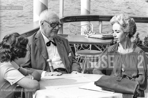 Venice, 1980. Classical guitarist Andrés Segovia -in Venice to receive the A Life for Music  award- on the terrace of the Hotel Bauer on the Grand Canal with his son Carlos Andrés and his wife Emilia Corral Sancho / Venezia, 1980. Il chitarrista classico Andrés Segovia -a Venezia per ricevere il premio Una vita per la musica- sulla terrazza dellHotel Bauer sul Canal Grande con il figlio Carlos Andrés e la moglie Emilia Corral Sancho - ©Marcello Mencarini/Rosebud2