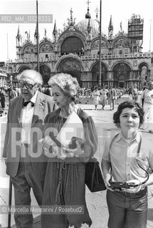 Venice, 1980. Classical guitarist Andrés Segovia - in Venice to receive the A Life for Music award - with his son Carlos Andrés and his wife Emilia Corral Sancho at St. Marks Square  / Venezia, 1980. Il chitarrista classico Andrés Segovia - a Venezia per ricevere il premio Una vita per la musica - con il figlio Carlos Andrés e la moglie Emilia Corral Sancho in piazza San Marco - ©Marcello Mencarini/Rosebud2