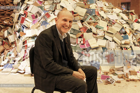 Marino Sinibaldi - Journalist and editor in chief of Radio 3 RAI (the cultural station of Italian public radio) - in front of an installation by Alicia Martin at Libri Come Literary Festival. Parco della Musica Auditorium in Rome, March 8, 2012 / Marino Sinibaldi - giornalista e direttore di Radio 3 RAI - davanti a uninstallazione di Alicia Martin alla rassegna letteraria Libri Come. Auditorium Parco della Musica di Roma, 8 marzo 2012 - ©Marcello Mencarini/Rosebud2