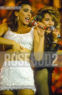 Sanremo Music festival 1991. Italian pop singers Sabrina Salerno and jo Squillo performing their song Siamo Donne / Festival di Sanremo 1991. Sabrina Salerno e Jo Squillo cantano Siamo donne - ©Marcello Mencarini/Rosebud2