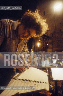 Rome, Baths of Caracalla, 1991. Greek composer Mikis Theodorakis during a rehearsal / Roma, Terme di Caracalla, 1991. Il compositore greco Mikis Theodorakis durante una prova - ©Marcello Mencarini/Rosebud2