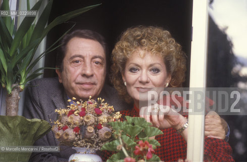 Rome, about 1985. Actors Aroldo Tieri and Giuliana Lojodice at a window of their house / Roma, 1985 circa. Gli attori Aroldo Tieri e Giuliana Lojodice affacciati a una finestra della loro casa - ©Marcello Mencarini/Rosebud2