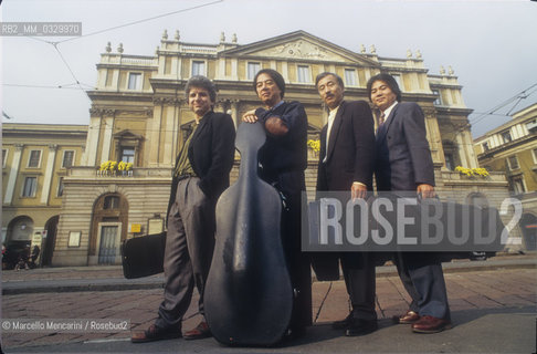 Milan, 1993. Tokyo String Quartet in front of La Scala Theater / Milano, 1993. Il Tokyo String Quartet davanti al Teatro alla Scala - ©Marcello Mencarini/Rosebud2