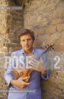 Rome, Basilica of Saint Sabina on the Aventine Hill, 1988. Violinist Uto Ughi / Roma, Basilica di Santa Sabina allAventino, 1988. Il violinista Uto Ughi - ©Marcello Mencarini/Rosebud2