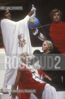 Pesaro, August 18, 1984. Rossini Opera Festival. Mezzo-soprano Lucia Valentini Terrani as Marchesa Melibea, soprano Katia Ricciarelli as Madame Cortese and basso buffo Enzo Dara as Baron Trombonok in Il viaggio a Reims (The Jorney to Reims) by Gioacchino Rossini. This is the first performance of that opera staged by Luca Ronconi and conducted by Claudio Abbado, after the reconstruction of its manuscript, assumed lost, in the 1970s / Pesaro, 18 agosto 1984. Rossini Opera Festival. Il mezzosoprano Lucia Valentini Terrani nel ruolo della Contessa Melibea, Il soprano Katia Ricciarelli nel ruolo di Madame Cortese e il basso buffo Enzo Dara nel ruolo del Barone di Trombonok ne Il viaggio a Reims di Gioacchino Rossini. E la prima rappresentazione dellopera con la regia di Luca Ronconi e la direzione dorchestra di Clauio Abbado, dopo il ritrovamento e la ricomposizione negli anni 70 del suo manoscritto che si credeva perduto - ©Marcello Mencarini/Rosebud2