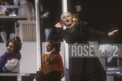 Pesaro, August 18, 1984. Rossini Opera Festival. Soprano Katia Ricciarelli as Madame Cortese in Il viaggio a Reims (The Jorney to Reims) by Gioacchino Rossini. This is the first performance of that opera staged by Luca Ronconi and conducted by Claudio Abbado, after the reconstruction of its manuscript, assumed lost, in the 1970s / Pesaro, 18 agosto 1984. Rossini Opera Festival. Il soprano Katia Ricciarelli nel ruolo di Madame Cortese ne Il viaggio a Reims di Gioacchino Rossini. E la prima rappresentazione dellopera con la regia di Luca Ronconi e la direzione dorchestra di Clauio Abbado, dopo il ritrovamento e la ricomposizione negli anni 70 del suo manoscritto che si credeva perduto - ©Marcello Mencarini/Rosebud2