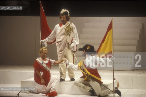 Milan, La Scala Theater, 1985. Mezzo-soprano Lucia Valentini Terrani as Marchesa Melibea and tenor Chris Merritt as Count Libenskof in Il viaggio a Reims (The Jorney to Reims) by Gioacchino Rossini, staged by Luca Ronconi and directed by Claudio Abbado / Milano, Teatro alla Scala, 1985. Il tenore Chris Merritt nel ruolo del Conte Libenskof e il mezzosoprano Lucia Valentini Terrani nel ruolo della Contessa Melibea ne Il viaggio a Reims di Gioacchino Rossini, con la regia di Luca Ronconi e la direzione dorchestra di Claudio Abbado - ©Marcello Mencarini/Rosebud2