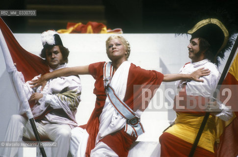 Pesaro, August 18, 1984. Rossini Opera Festival. Mezzo-soprano Lucia Valentini Terrani as Marchesa Melibea in Il viaggio a Reims (The Jorney to Reims) by Gioacchino Rossini. This is the first performance of that opera staged by Luca Ronconi and conducted by Claudio Abbado, after the reconstruction of its manuscript, assumed lost, in the 1970s / Pesaro, 18 agosto 1984. Rossini Opera Festival. Il mezzosoprano Lucia Valentini Terrani nel ruolo della contessa Melibea ne Il viaggio a Reims di Gioacchino Rossini. E la prima rappresentazione dellopera con la regia di Luca Ronconi e la direzione dorchestra di Claudio Abbado, dopo il ritrovamento e la ricomposizione negli anni 70 del suo manoscritto che si credeva perduto - ©Marcello Mencarini/Rosebud2