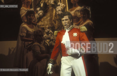 Pesaro, August 18, 1984. Rossini Opera Festival. Staging of Il viaggio a Reims (The Jorney to Reims) by Gioacchino Rossini.Bass-baritone Samuel Ramey as Lord Sidney. This is the first performance of that opera, staged by Luca Ronconi and conducted by Claudio Abbado, after the reconstruction of its manuscript, assumed lost, in the 1970s / Pesaro, 18 agosto 1984. Rossini Opera Festival. Messa in scena de Il viaggio a Reims di Gioacchino Rossini. Il basso baritono Samuel Ramey nel ruolo di Lord Sidney. E la prima rappresentazione dellopera, con la regia di Luca Ronconi e la direzione dorchestra di Claudio Abbado, dopo il ritrovamento e la ricomposizione negli anni 70 del suo manoscritto che si credeva perduto - ©Marcello Mencarini/Rosebud2