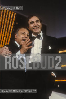 Sanremo Music festival 1984. Italian singer Claudio Villa, special guest of the Festival, and TV presenter Pippo Baudo / Festival di Sanremo 1984. Il cantante Claudio Villa, ospite del festival, e il presentatore televisivo Pippo Baudo - ©Marcello Mencarini/Rosebud2