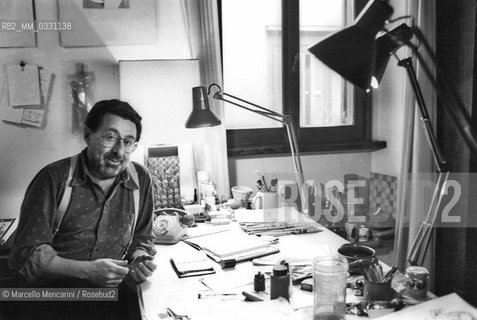 Rome, 1980. Italian cartoonist Pino Zac (real name Giuseppe Zaccaria) in his studio / Roma, 1980. Il disegnatore Pino Zac nel suo studio -
 ©Marcello Mencarini/Rosebud2