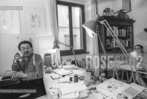 Rome, 1980. Italian cartoonist Pino Zac (real name Giuseppe Zaccaria) in his studio / Roma, 1980. Il disegnatore Pino Zac nel suo studio -
 ©Marcello Mencarini/Rosebud2