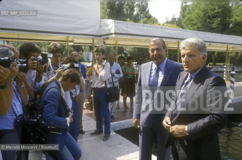 Venice Lido, Venice Film Festival, about 1985. General Director of RAI Italian public television Biagio Agnes and RAI President Sergio Zavoli arrive / Lido di Venezia, Mostra del Ciname di Venezia, 1985 circa. Arrivo del direttore generale della RAI radiotelevisione italiana Biagio Agnes e del presidente della RAI Sergio Zavoli - ©Marcello Mencarini/Rosebud2