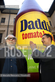 Artist Paul McCarthy and Massimiliano Gioni (curator at the New Museum in New York and director of the Nicola Trussardi Foundation) in front of Paul McCarthys work Daddies Tomato Ketchup Inflatable exhibited at Pig Island, the first major solo show in an Italian institution by the American artist Paul McCarthy. Fondazione Nicola Trussardi, Palazzo Citterio, Via Brera 14, Milan. May - July, 2010 / Lartista Paul McCarthy e Massimiliano Gioni (curatore presso il New Museum di new York a direttore della Fondazione Nicola Trussardi) davanti allopera di McCarthy Daddies Tomato Ketchup Inflatable esposta a Pig Island, la prima personale dedicata allartista americano da una istituzione italiana.  Fondazione Nicola Trussardi, Palazzo Citterio, Via Brera 14, Milano. maggio-luglio 2010 - ©Marcello Mencarini/Rosebud2