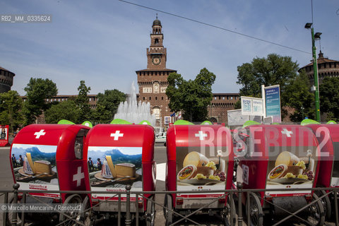 Milan Expo 2015. Bike rickshaws sponsored by Switzerland in front of Castello Sforzesco  / Expo Milano 2015. Biciclette risciò sponsorizzate dalla Svizzera davanti al Castello Sforzesco - ©Marcello Mencarini/Rosebud2