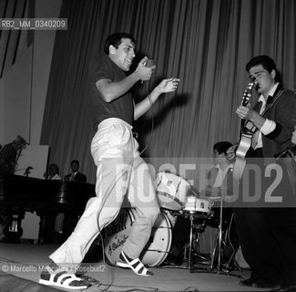 Italian singer Adriano Celentano and his guitarist Gino Santercole at the Rock Festival in 1961 / Il cantante Adriano Celentano e il suo chitarrista Gino Santercole al Festival del Rock del 1961 - ©Marcello Mencarini/Rosebud2