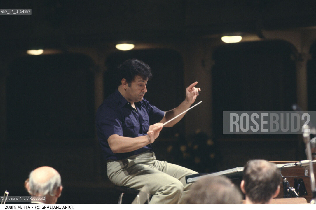 -Venice,1990. Ritratto del direttore dorchestra Zubin Mehta durante un concerto.  Musica Classica Direttore Orchestra ritratto .-Venice,1990. Portrait of the conductor Zubin Mehta during a concert ©Graziano Arici/Rosebud2