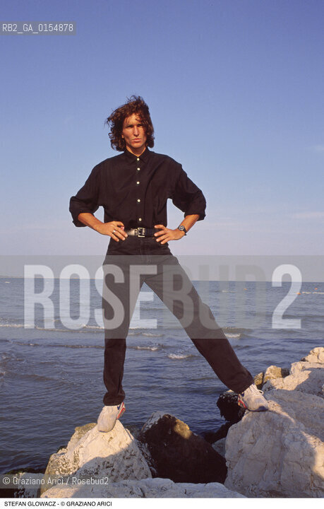 Venezia,1992.Ritratto dello sportivo Stefan Glowacz,arrampicatore Sport arrampicata libera roccia ritratto spiaggia mare.Venice,1992.Portrait of the rock climber Stefan Glowacz  ©Graziano Arici/Rosebud2
