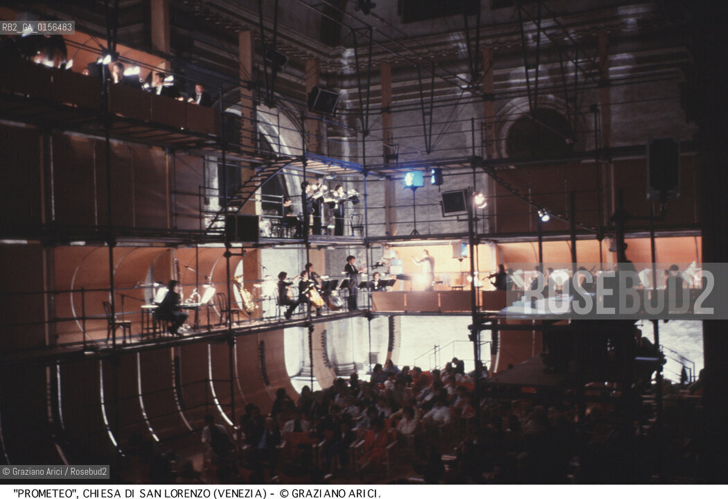 -Venezia,1984.Chiesa di San Lorenzo. Opera del compositore contemporaneo Luigi Nono, Prometeo - Tragedia dellascolto prova generale, testo di Massimo Cacciari, struttura scenica dellarchitetto Renzo Piano, luci del pittore Emilio Vedova.Il compositore Luigi Nono durante le prove. musica compositore opera Prometeo contemporanea elettronica filosofia architettura pittura ritratto.-Venice,1984. Work  Prometeo - Tragedia dellascolto directed by contemporary composer Luigi Nono,text by the philosopher Massimo Cacciari,scenography by the architect Renzo Piano,stage lighting by the painter Emilio Vedova. Portrait of the composer Luigi Nono ©Graziano Arici/Rosebud2