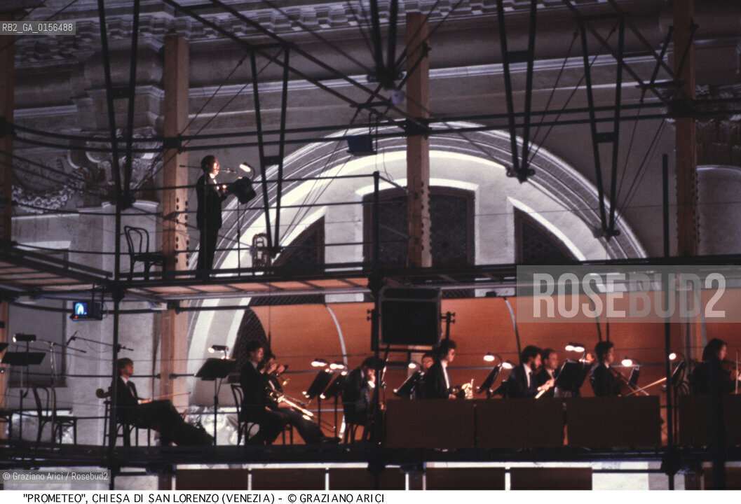 -Venezia,1984.Chiesa di San Lorenzo. Opera del compositore contemporaneo Luigi Nono, Prometeo - Tragedia dellascolto prova generale, testo di Massimo Cacciari, struttura scenica dellarchitetto Renzo Piano, luci del pittore Emilio Vedova.Il compositore Luigi Nono durante le prove. musica compositore opera Prometeo contemporanea elettronica filosofia architettura pittura ritratto.-Venice,1984. Work  Prometeo - Tragedia dellascolto directed by contemporary composer Luigi Nono,text by the philosopher Massimo Cacciari,scenography by the architect Renzo Piano,stage lighting by the painter Emilio Vedova. Portrait of the composer Luigi Nono ©Graziano Arici/Rosebud2