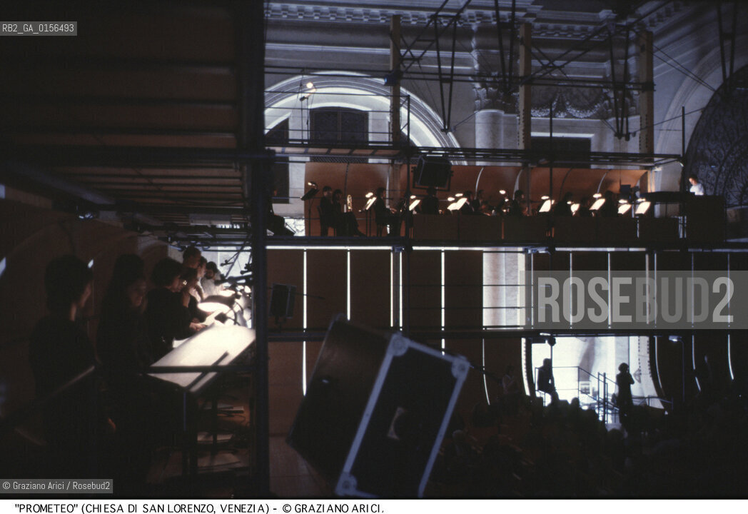 -Venezia,1984.Chiesa di San Lorenzo. Opera del compositore contemporaneo Luigi Nono, Prometeo - Tragedia dellascolto prova generale, testo di Massimo Cacciari, struttura scenica dellarchitetto Renzo Piano, luci del pittore Emilio Vedova.Il compositore Luigi Nono durante le prove. musica compositore opera Prometeo contemporanea elettronica filosofia architettura pittura ritratto.-Venice,1984. Work  Prometeo - Tragedia dellascolto directed by contemporary composer Luigi Nono,text by the philosopher Massimo Cacciari,scenography by the architect Renzo Piano,stage lighting by the painter Emilio Vedova. Portrait of the composer Luigi Nono ©Graziano Arici/Rosebud2
