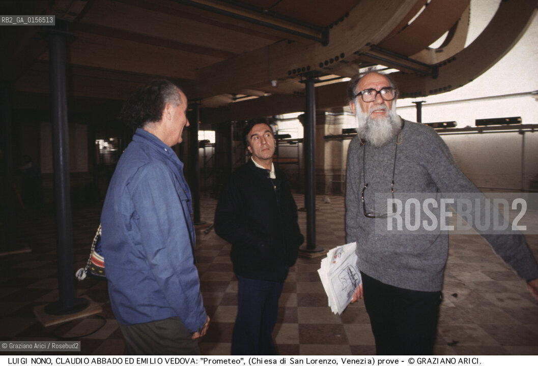 -Venezia,1984.Chiesa di San Lorenzo. Opera del compositore contemporaneo Luigi Nono, Prometeo - Tragedia dellascolto prova generale, testo di Massimo Cacciari, struttura scenica dellarchitetto Renzo Piano, luci del pittore Emilio Vedova.Il compositore Luigi Nono durante le prove con Emilio Vedova e Claudio Abbado. musica compositore opera Prometeo contemporanea elettronica filosofia architettura pittura ritratto.-Venice,1984. Work  Prometeo - Tragedia dellascolto directed by contemporary composer Luigi Nono,text by the philosopher Massimo Cacciari,scenography by the architect Renzo Piano,stage lighting by the painter Emilio Vedova. Portrait of the composer Luigi Nono with  Emilio Vedova and Claudio Abbado ©Graziano Arici/Rosebud2