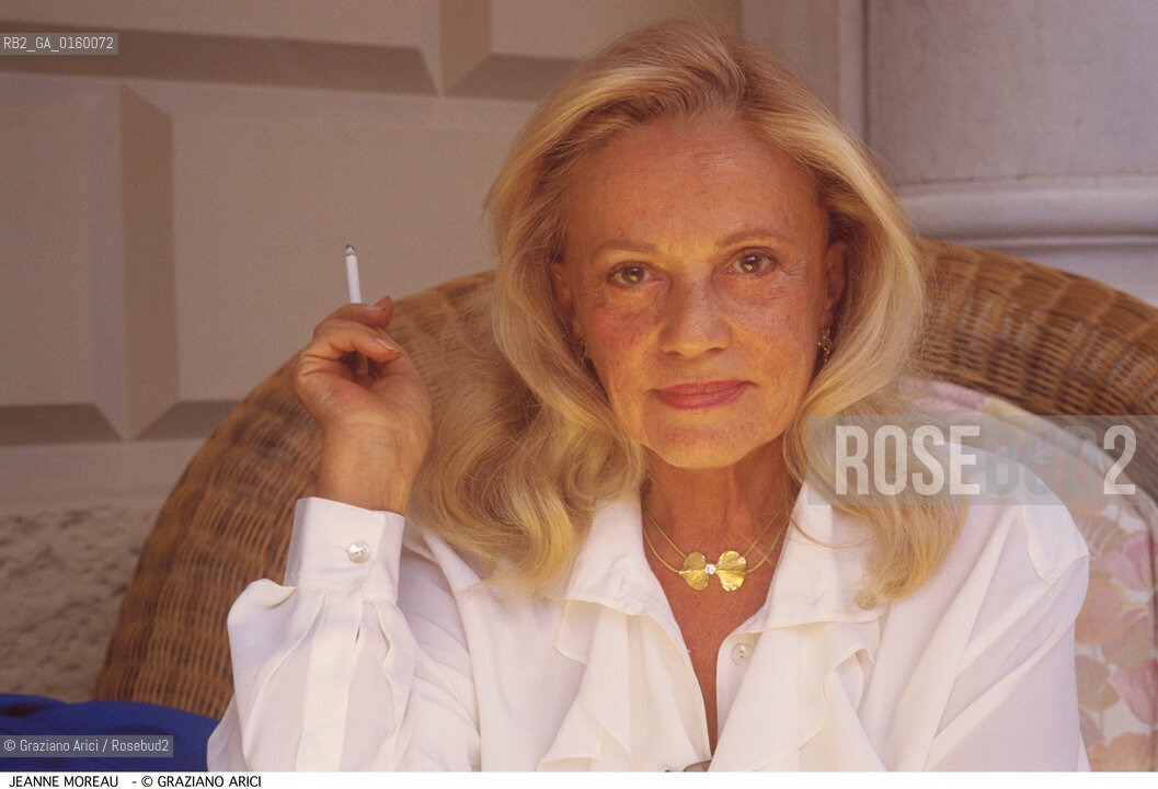 Caption: Nome: .MOREAU JEANNE.Descrizione: .CINEMA ATTRICE / FUMA UNA SIGARETTA.Credit: ©Graziano Arici/Rosebud2 / Costo: .A.Nazione: .FRANCIA.Cittˆ: ..Data: .1988