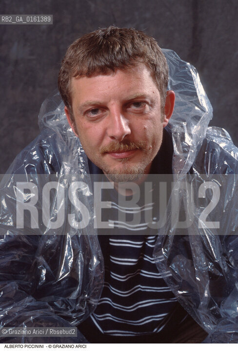 Caption: Nome: .PICCININI ALBERTO.Descrizione: .GIORNALISTA.Credit: ©Graziano Arici/Rosebud2 / Costo: .A.Nazione: .ITALIA.Cittˆ: ..Data: .1997