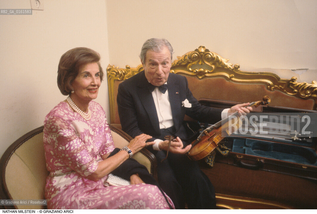 Caption: Nome: .MILSTEIN NATHAN.Descrizione: .MUSICA CLASSICA VIOLINISTA/CON LA MOGLIE/VIOLINO.Credit: ©Graziano Arici/Rosebud2 / Costo: .A.Nazione: .USA.Cittˆ: ..Data: .1991