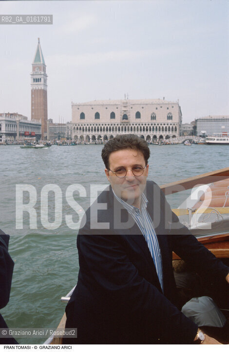 Caption: Nome: .TOMASI FRAN.Descrizione: .MUSICA ORGANIZZATORE/SULLO SFONDO PIAZZA SAN MARCO A VENEZIA.Credit: ©Graziano Arici/Rosebud2 / Costo: .A.Nazione: .ITALIA.Cittˆ: .VENEZIA.Data: .1991
