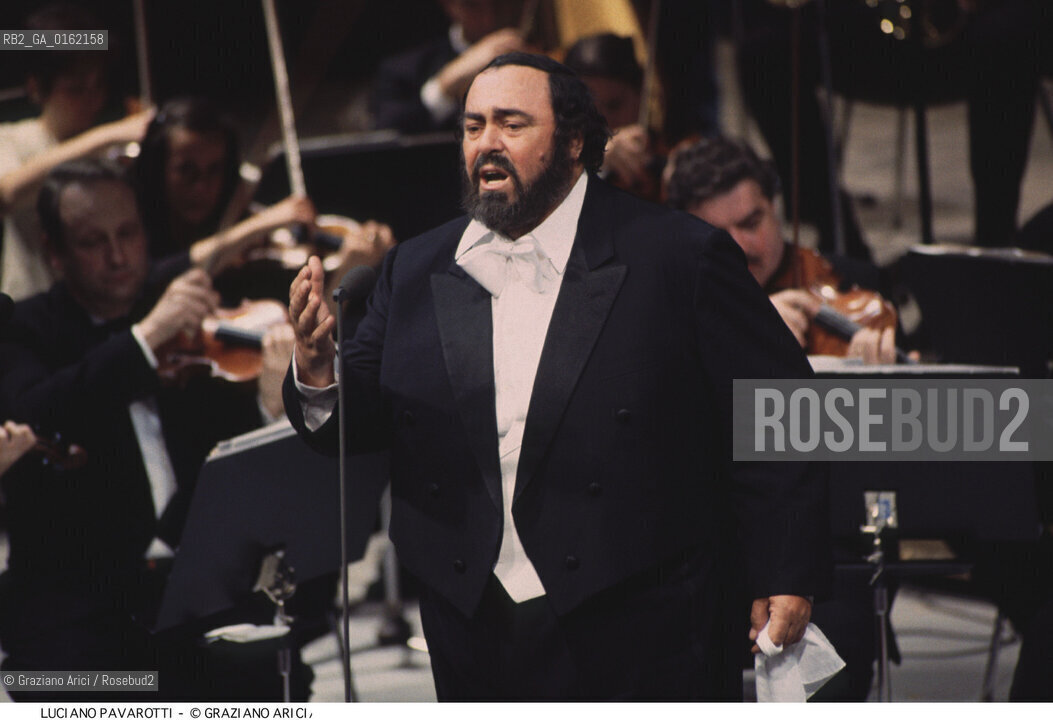 Nome: .PAVAROTTI LUCIANO.Descrizione: .MUSICA CLASSICA CANTANTE LIRICO TENORE/CON ORCHESTRA SULLO SFONDO.Credit: ©Graziano Arici/Rosebud2 / Costo: .A.Nazione: .ITALIA.Cittˆ: .VENEZIA.Data: .1994.