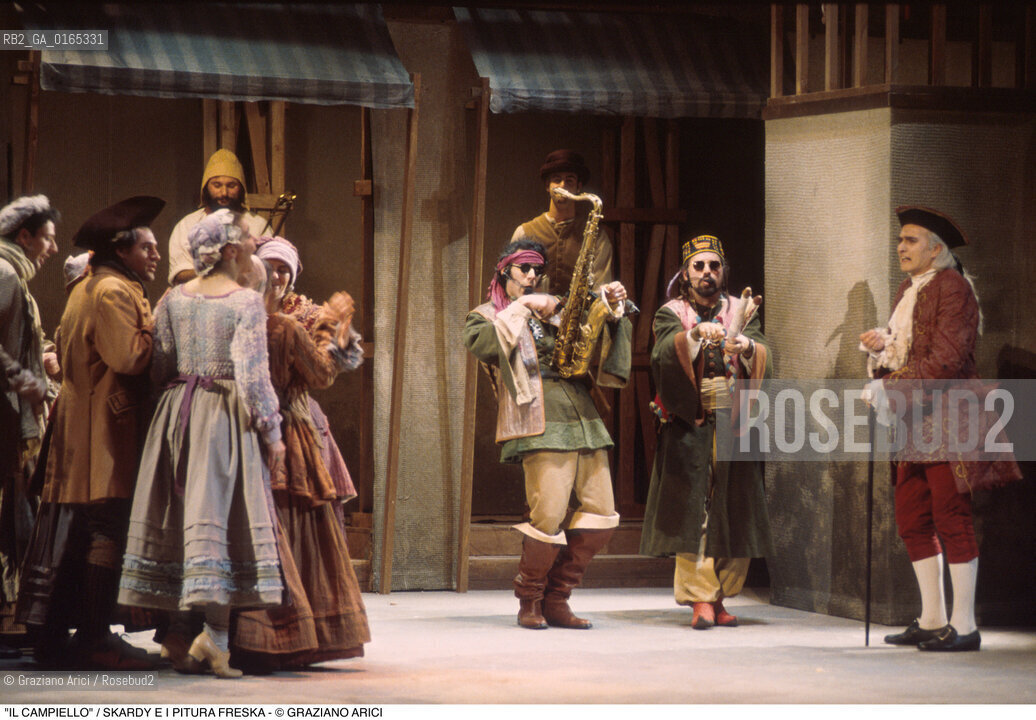Caption: Caption: Nome: .IL CAMPIELLO .Descrizione: .TEATRO / OPERA DI CARLO GOLDONI / IL CANTANTE SKARDY CON IL GRUPPO MUSICALE VENEZIANO PITURA FRESKA CHE HA MUSICATO LO SPETTACOLO / AL TEATRO GOLDONI.Credit: ©Graziano Arici/Rosebud2 Costo: .A.Nazione: .ITALIA.Cittˆ: ..Data: .1995.