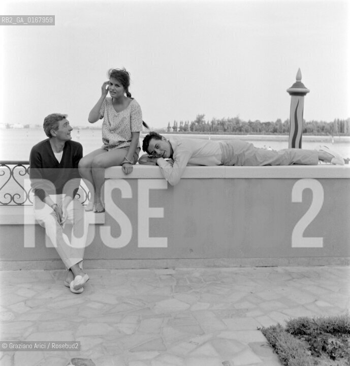 THE ACTRESS CLAUDIA CARDINALE   WITH THE ACTORS PHILIPPE NICAUD AND ANDRE VERSINI AT INTERNATIONAL FILM FESTIVAL  IN VENICE - 1958 - © ARCHIVIO Graziano Arici/Rosebud2  / ATTRICE / MOSTRA DEL CINEMA