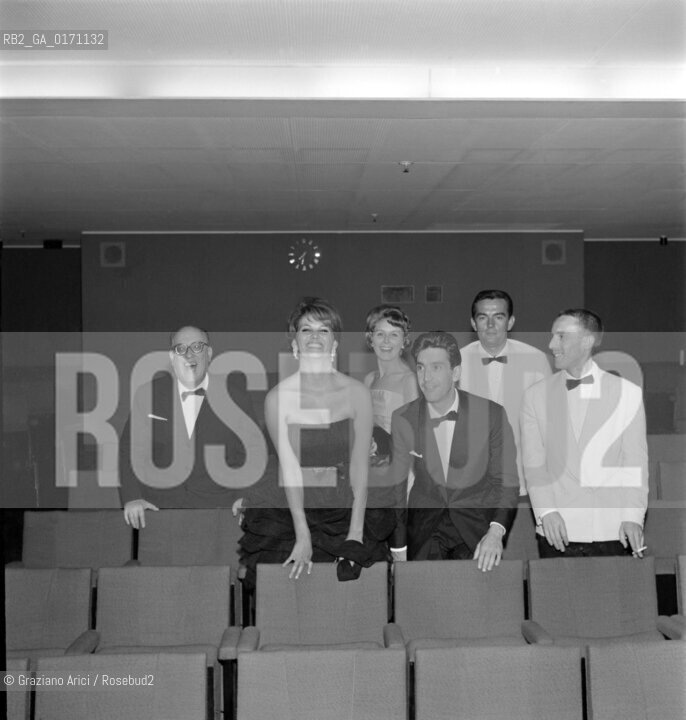 THE ACTRESS CLAUDIA CARDINALE WITH THE PRODUCER FRANCO CRISTALDI AND ? AT INTERNATIONAL FILM FESTIVAL IN VENICE FOR THE MOVIE ROCCO E I SUOI FRATELLI  - 1960 - © ARCHIVIO Graziano Arici/Rosebud2  / ATTORE /  MOSTRA DEL CINEMA /