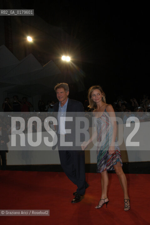 01/09/02 - 59. INTERNATIONAL FILM FESTIVAL IN VENICE LIDO - THE ACTOR HARRISON FORD WITH HIS GIRLFRIEND - FILM K-19:THE WIDOWMAKER - © 2002 Graziano Arici/Rosebud2 - MOSTRA DEL CINEMA