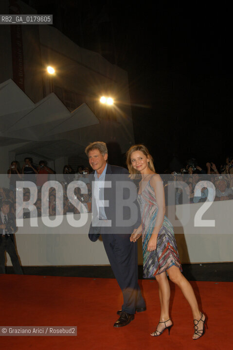 01/09/02 - 59. INTERNATIONAL FILM FESTIVAL IN VENICE LIDO - THE ACTOR HARRISON FORD WITH HIS GIRLFRIEND - FILM K-19:THE WIDOWMAKER - © 2002 Graziano Arici/Rosebud2 - MOSTRA DEL CINEMA