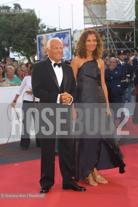 29/08/02 - 59. INTERNATIONAL FILM FESTIVAL IN VENICE LIDO :   THE FASHION STYLIST GIORGIO ARMANI WITH HER NEPHEW ROBERTA   - © 2002 - Graziano Arici/Rosebud2 -  MOSTRA DEL CINEMA / STILISTA