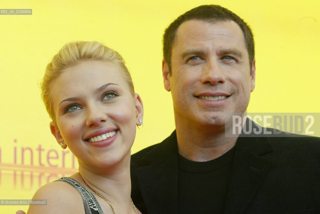 02_09_04 VENICE - 61¡ FILM FESTIVAL - FILM A LONG SONG FOR BOBBY LONG. THE ACTOR JOHN TRAVOLTA AND THE ACTRESS SCARLETT JOHANSSON. ©Graziano Arici/Rosebud2 CINEMA