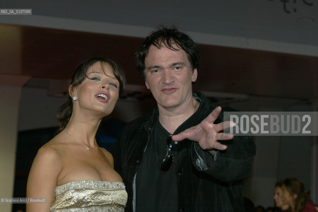 04_09_04 VENICE 61¡ FILM FESTIVAL - THE DIRECTOR QUENTIN TARANTINO WITH GIORGINA CHAPMAN.©Graziano Arici/Rosebud2 CINEMA