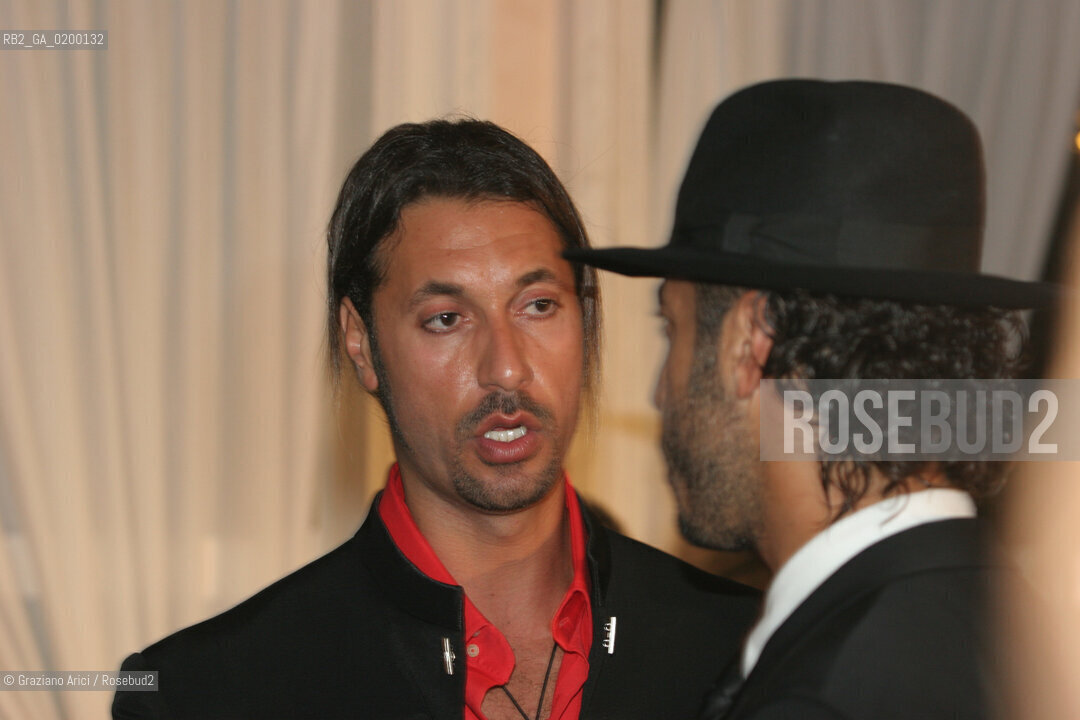 08_09_05 - 62 VENICE FILM FESTIVAL -THE LYBIAN PARTY - THE BROTHERS MOTHASSAN AND SAADI GHEDDAFI.©Graziano Arici/Rosebud2