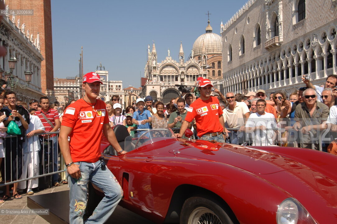 VENICE 6/09/06 - INAUGURATION OF VENICE FERRARI STORE : MICHAEL SHUMACHER AND FELIPE MASSA IN ST. MARKS SQUARE ©Graziano Arici/Rosebud2