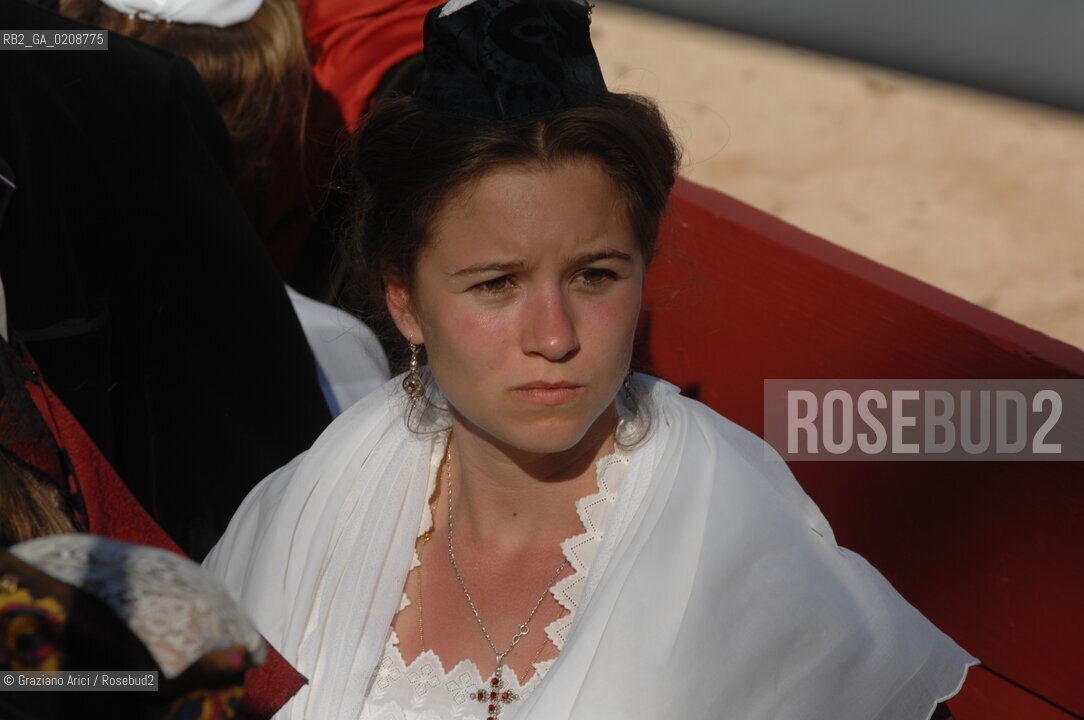 ARLES (FRANCE, PROVENCE) 1 MAY 2008 - 1 MAY HOLIDAY - FETE DES GARDIANS - HOLIDAY OF THE CAMARGUE CATTLE FARMER AND ELECTION OF ARLES QUEEN ROMAN ARENA ©Graziano Arici/Rosebud2 CAVALLO FESTA DEI GARDIANS COSTUME MAGGIO GIOIELLO PROVENZA CAPPELLO BAMBINO COURSE CAMARGUESE TORO GEO