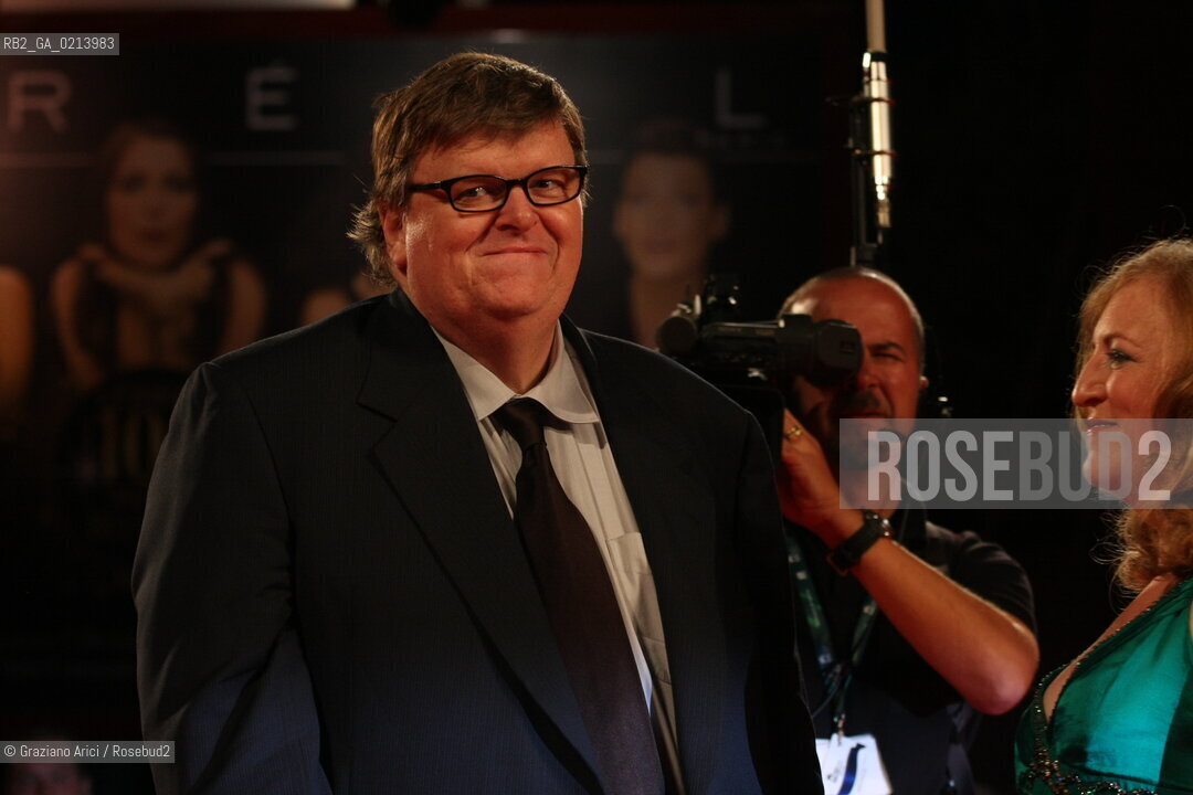 Italy, Venice - September 06th, 2009.66th VENICE INTERNATIONAL FILM FESTIVAL - FILM:CAPITALISM: A LOVE STORY. RED CARPET - THE DIRECTOR MICHAEL MOORE WITH HIS WIFE KATHLEEN GLYNN