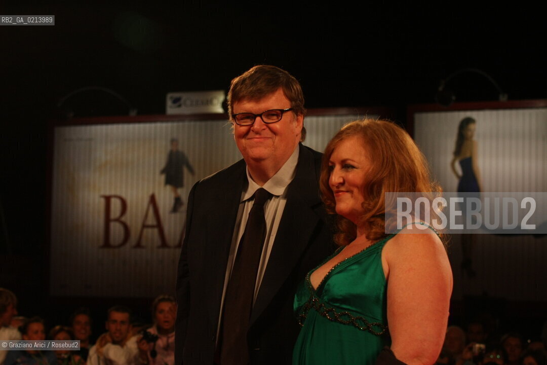 Italy, Venice - September 06th, 2009.66th VENICE INTERNATIONAL FILM FESTIVAL - FILM:CAPITALISM: A LOVE STORY. RED CARPET - THE DIRECTOR MICHAEL MOORE WITH HIS WIFE KATHLEEN GLYNN