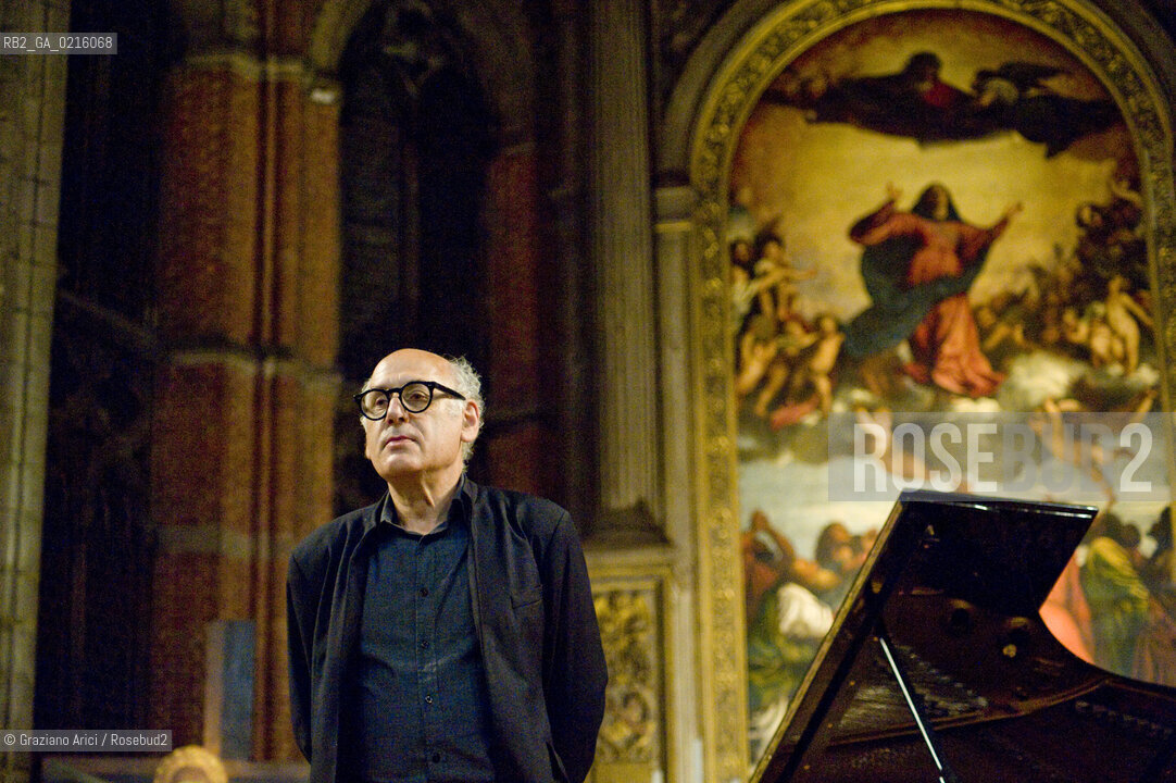 Venice 13/5/10 - The composer and pianist Michael Nyman in concert in Frari Church in Venice, in front of the well-known Tizianòs painting Assunta musica pianista ©Graziano Arici/Rosebud2