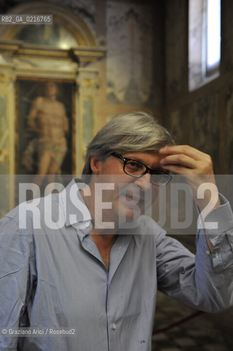 Venice - 12/7/10 - Cà dOro Museum : Wooden grate in front of  St. Sebastian by Andrea Mantegna. The wooden grate was put by an architect follower of Carlo Scarpa . The Curator of the Venetians Museums Vittorio Sgarbi order to take away the grate - Museo grata sebastiano ©Graziano Arici/Rosebud2