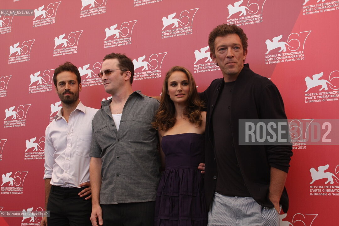 67th Venice International Film Festival - Venice September 1, 2010 - Film Black Swan - Actress Natalie Portman with actor Vincent Cassel (right) and the director Darren Aronofsky, left the actor Benjamin Millepied