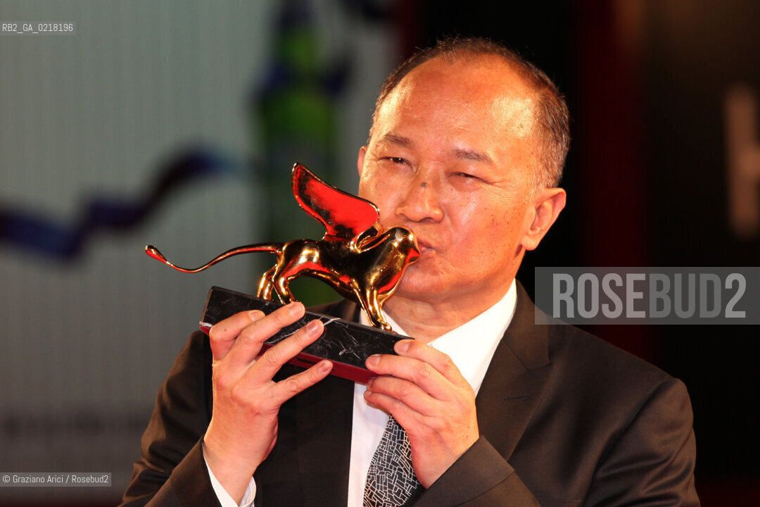 67th Venice International Film Festival - Venice September 3, 2010 - Red Carpet of the film Jianyu (Reign of Assassins) And The Golden Lion For Lifetime Achievement to John Woo. The director John Woo with the Lion